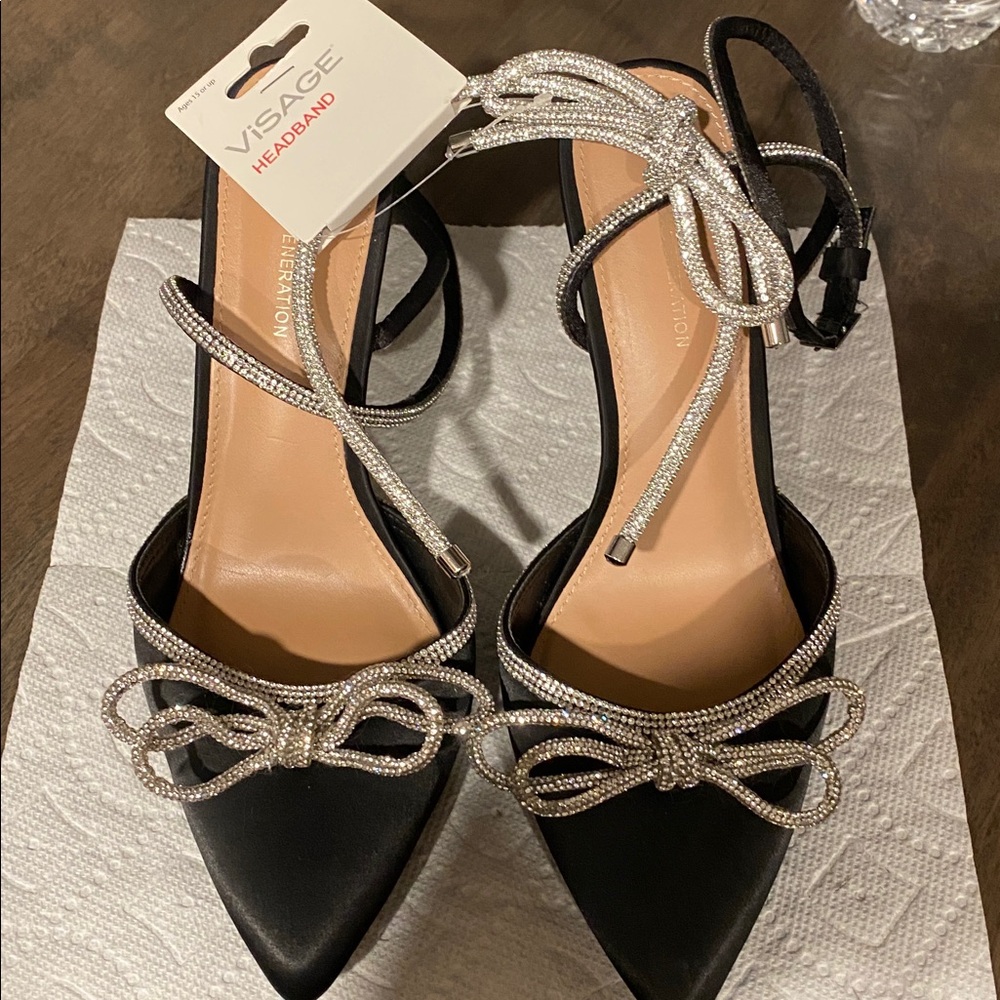 BCBG Black Pointed-Toe Ankle-Strap Heels with Crystal Bow and headband